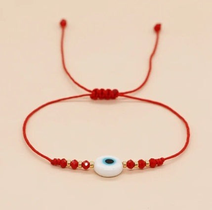 <p>Ruby Evil Eye Bead Red String Bracelet</p>