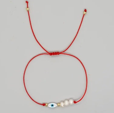 <p>MOP Eye &amp; FWP Red String Bracelet</p>