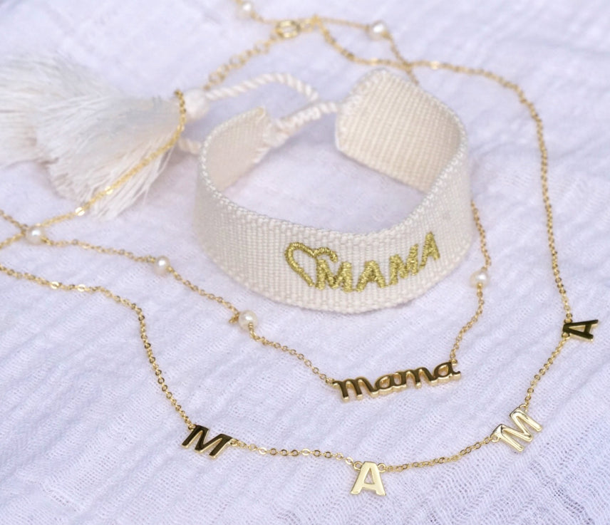 <p>Gold Heart Mama Threaded Bracelet</p>