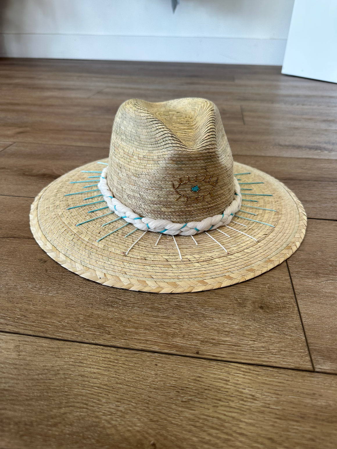 <p>Evil Eye &amp; Lines Straw Palm Hat</p>