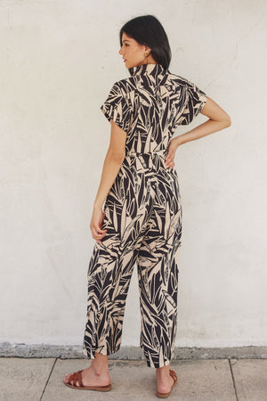 <p>Shifting Sand Button Up Jumpsuit</p>