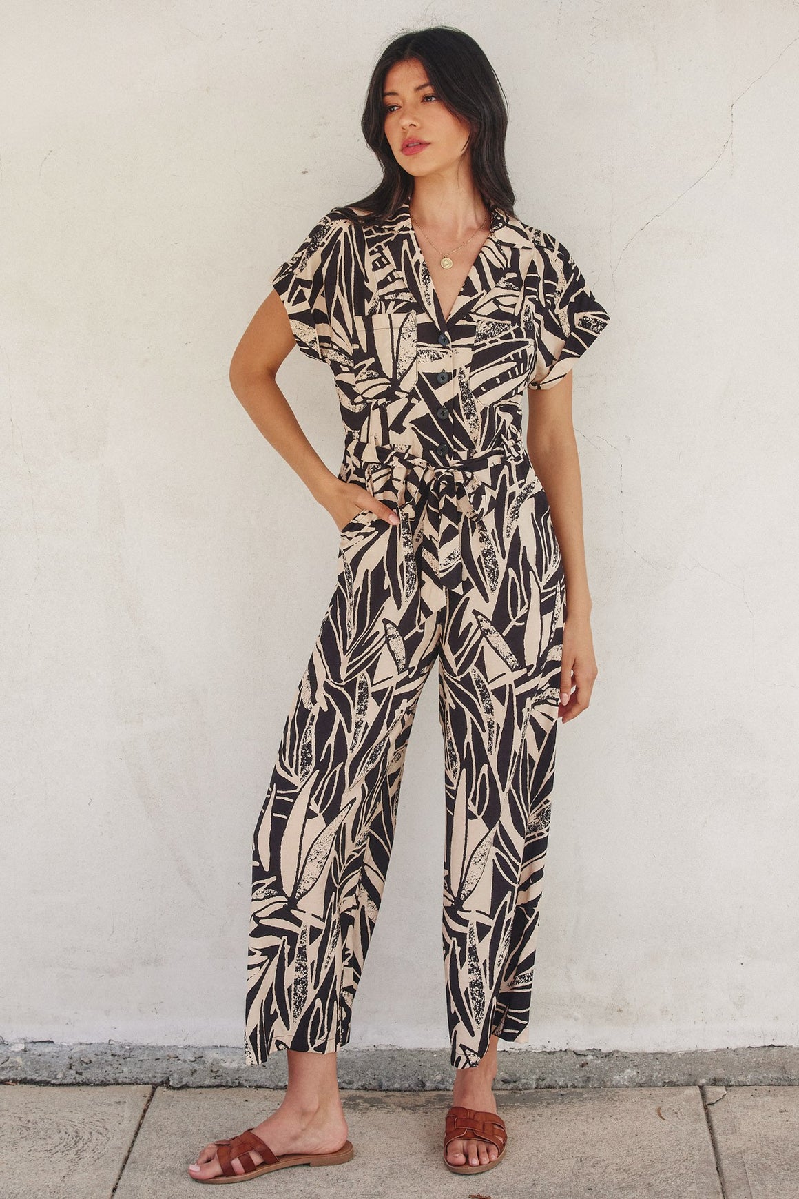 <p>Shifting Sand Button Up Jumpsuit</p>