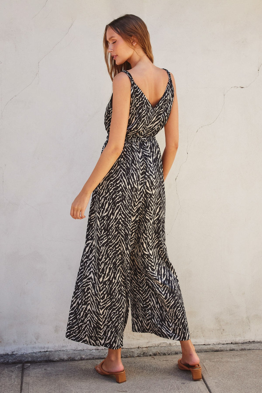 <p>Untamed Cord Strap Surplice Jumpsuit</p>