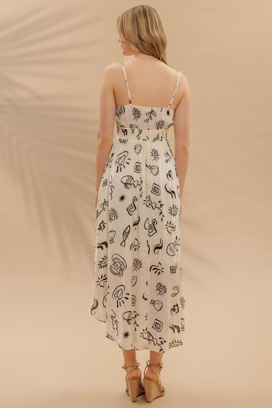 <p>Doodle Print Shirred Waist Midi Dress</p>
