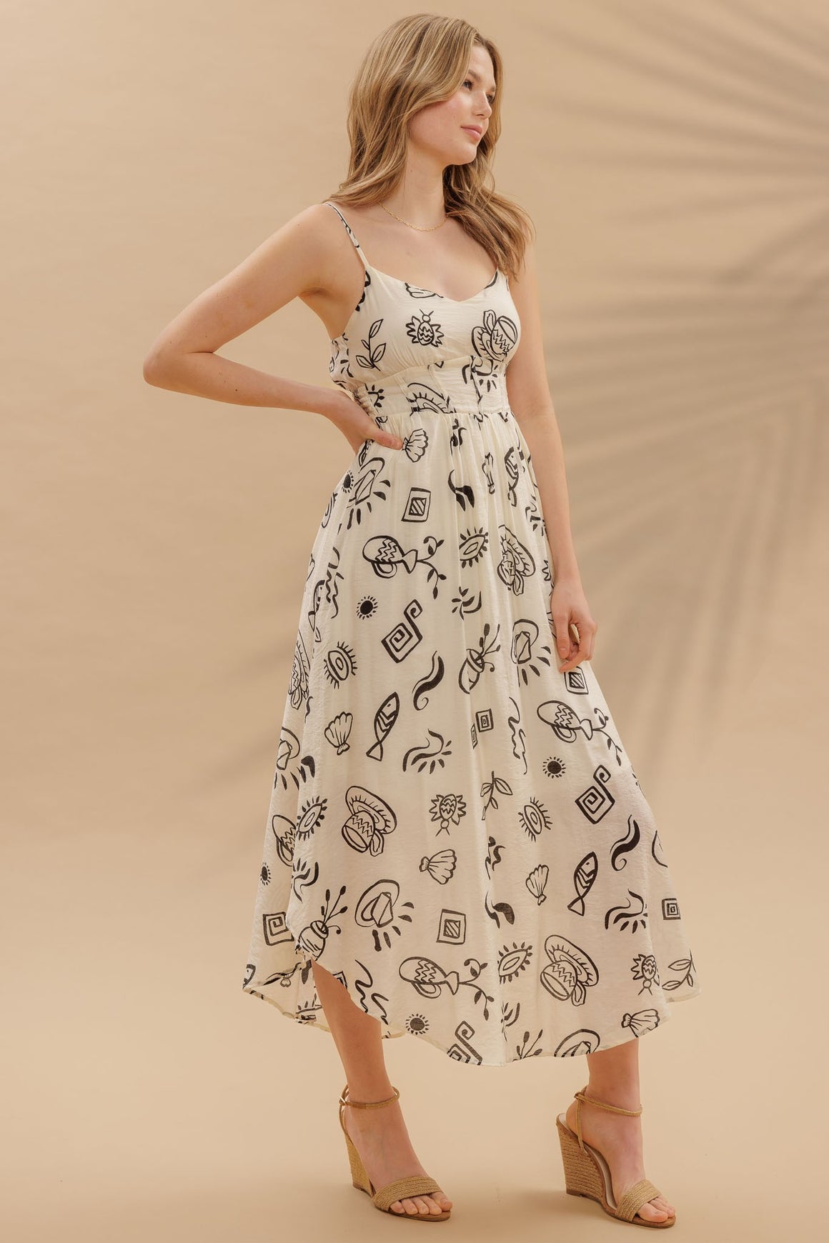<p>Doodle Print Shirred Waist Midi Dress</p>