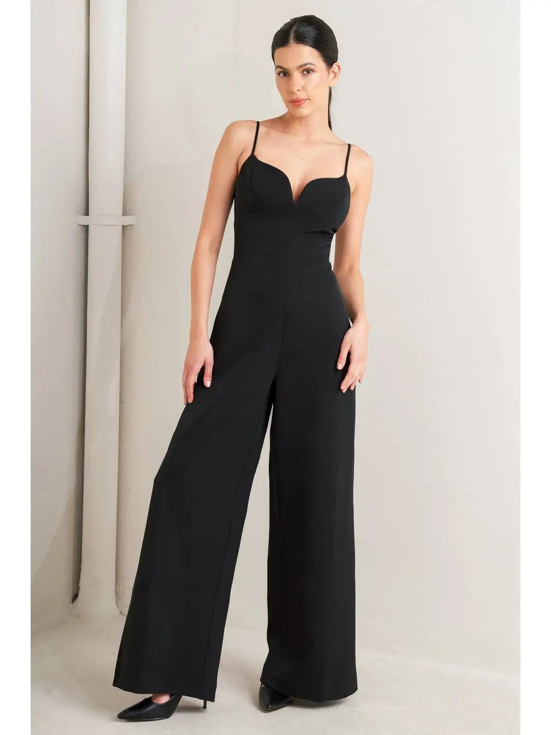 <p>Solid Woven Jumpsuit</p>