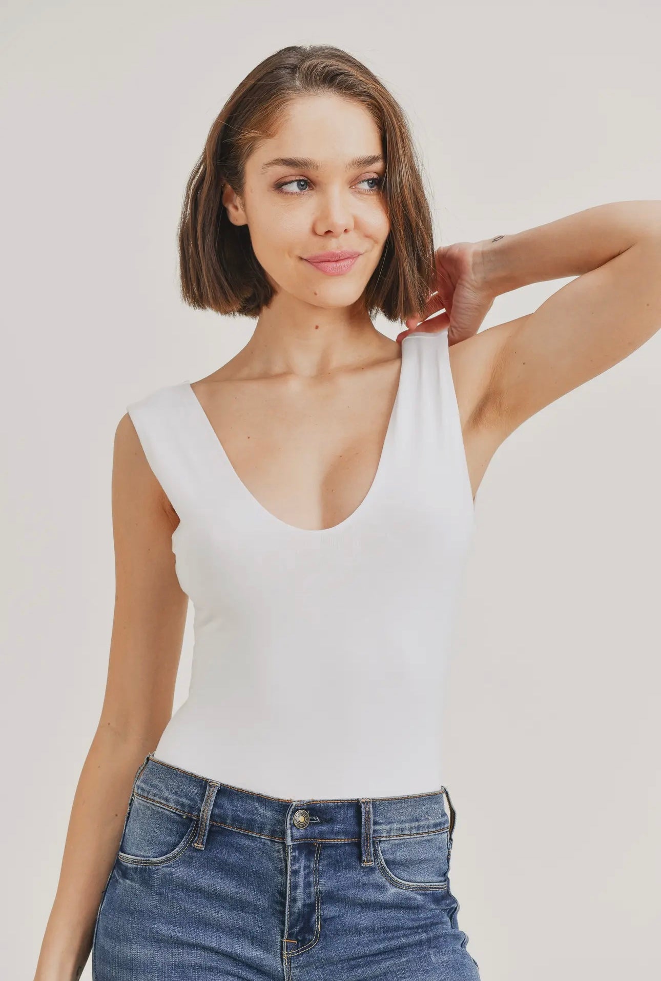 <p>Sophie Plunge Neck Bodysuit</p>