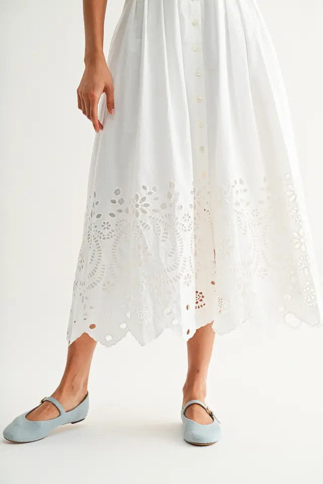 <p>Embroidered Cotton Midi Dress</p>