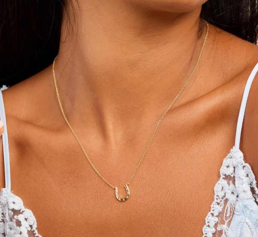 <p>Bezel CZ Horshoe Necklace</p>